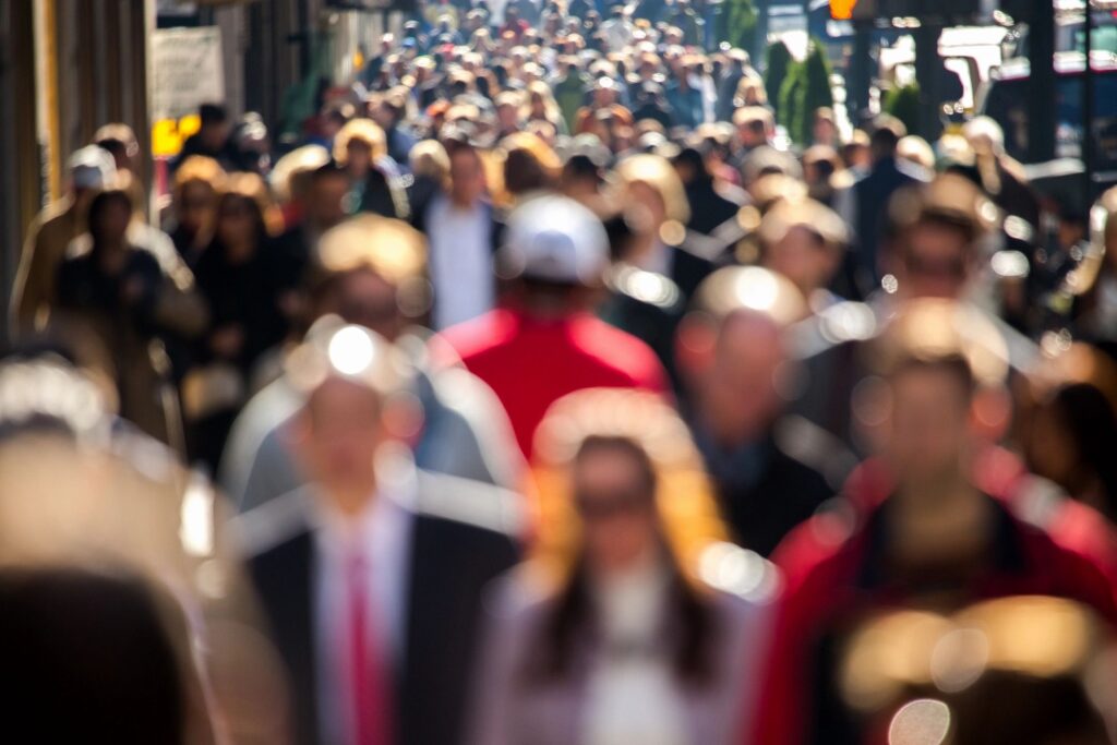 People walking in the street together - a membership community